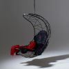 Studio Stirling - Lucky Bean at Design Joburg 2022 | Swing Chair in Chairs by Studio Stirling | Sandton Convention Centre in Sandton. Item made of steel & leather compatible with minimalism and modern style