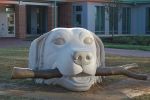 Swimming Retriever | Public Sculptures by Jim Sardonis. Item made of bronze & stone