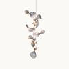 Dune 8 Vertical Cluster Pendant Light | Chandeliers by MOSS Objects. Item composed of metal in contemporary or japandi style
