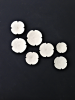 Floral ceramic wall art set of 7 white porcelain flowers | Wall Sculpture in Wall Hangings by Elizabeth Prince Ceramics. Item made of ceramic works with minimalism & contemporary style