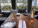 Custom dining tables and cafe tables for restaurant | Tables by Urban Wood Goods | Nantucket Island in Nantucket. Item composed of wood and steel
