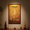 Yunjin Silk Brocade Yellow Dzambhala Thangka Art | Embroidery in Wall Hangings by Dynasty Artisan. Item composed of wood and fabric in contemporary or eclectic & maximalism style