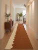 Handwoven Woolen Terracotta Runner Rug | Rugs by Evergreen Carpets. Item made of wool works with boho & minimalism style