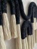 Black & Cream Macrame Wall Hanging, Modern Boho Fiber Art | Wall Hangings by Sarmal Design. Item made of cotton with fiber works with boho & art deco style
