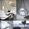 Soft Leather Swing in Santorini, Greece | Easy Chair in Chairs by Studio Stirling | Abyss Santorini in Oia. Item made of steel with leather works with boho & art deco style