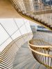 Continuous Bronze Curved Stair | Architecture by Amuneal | New York in New York. Item composed of steel
