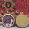 Zhaji Lhamo Thangka Gold Engraved Kalachakra Pendant | Ornament in Decorative Objects by Dynasty Artisan. Item composed of metal in contemporary or eclectic & maximalism style
