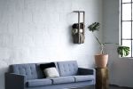 Modern Blanket Wall Rack | Storage by THE IRON ROOTS DESIGNS. Item made of oak wood compatible with minimalism and modern style