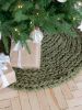 Green knitted Christmas tree skirt | Small Rug in Rugs by Anzy Home. Item composed of fabric