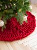 Red knitted Christmas tree skirt | Small Rug in Rugs by Anzy Home. Item made of fabric