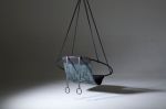 Genuine Leather Woven into a Hanging Swing Chair | Accent Chair in Chairs by Studio Stirling. Item made of steel & leather compatible with boho and minimalism style