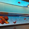 Blue Sky Pursuit | Glasswork in Wall Treatments by Carson Fox Studio | Pennsylvania Station in New York. Item made of synthetic
