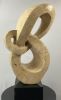Lover's Knot | Sculptures by Scott Gentry Sculpture, LLC. Item composed of stone in contemporary style