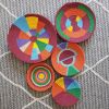 African Colourful Wall Plate set of 5 | Decorative Plate in Decorative Objects by Sarmal Design. Item composed of bamboo and cotton in boho or mid century modern style