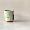 Handmade Tall Tea Cup with Drawings | Drinkware by cursive m ceramics. Item made of ceramic