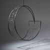 Studio Stirling Ndebele Wheel | Swing Chair in Chairs by Studio Stirling. Item composed of brass compatible with minimalism and modern style
