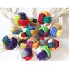 Hand-Painted Monkey's Fist Knots | Mixed Media by Cassandra Smith | Renaissance Columbus Westerville-Polaris Hotel in Westerville. Item made of fiber & synthetic