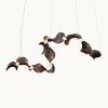 Dune 10 Curve in Metallic Tones Pendant Light | Chandeliers by MOSS Objects. Item made of metal works with contemporary & japandi style