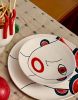 Plate with face of sellers | Dinnerware by Patrizia Italiano. Item composed of ceramic