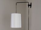 Industrial sconce with pleated toten lampshade, black and w | Sconces by Studio Pleat. Item made of metal & paper compatible with mid century modern and contemporary style