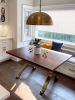 Black walnut dining table with brass wishbone legs | Tables by YJ Interiors. Item made of walnut with brass works with mid century modern & contemporary style