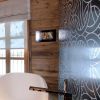 Rondò | Paneling in Wall Treatments by Kreoo | Chalet N in Lech. Item composed of marble