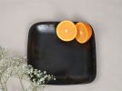 Longpi Pottery Side Plate - Square | Bowl in Dinnerware by ARTISAGA PRIVATE LIMITED. Item made of stone works with minimalism & modern style