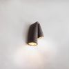 Black Melo Sconce - Minimalist Ceramic Ambient Lighting | Sconces by Catalin Filip. Item composed of wood and ceramic in boho or eclectic & maximalism style