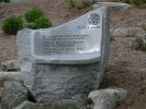 Boulder Seat | Public Sculptures by Jim Sardonis. Item made of granite