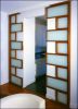 Interlocking Sliding Doors | Furniture by Brian Cullen Furniture. Item made of walnut with glass works with modern style