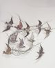 A flock of Golden Plovers | Wall Sculpture in Wall Hangings by Celia Smith. Item composed of metal
