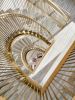 Continuous Bronze Curved Stair | Architecture by Amuneal | New York in New York. Item composed of steel