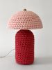 The Knitty Table Lamp in Cherry Red and Pale Pink | Lamps by Meg Morrison. Item made of fabric with ceramic works with boho & mid century modern style