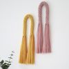 Minimalistic Woven tassel Arch Aarya in sunshine/dusty pink | Macrame Wall Hanging in Wall Hangings by YASHI DESIGNS by Bharti Trivedi. Item composed of fiber