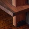 Custom Walnut Shelving Unit with Hidden Closet Door | Storage by Joe Cauvel of Cauv Design. Item made of walnut with steel