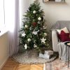 Knitted Christmas tree skirt in champagne color | Small Rug in Rugs by Anzy Home. Item composed of cotton