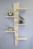 Moderne 5 | Shelving in Storage by Jim Thellefsen Design