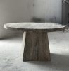 Silver Travertine Round Pedestal Dining Table | Tables by Phidias Atelier. Item made of marble