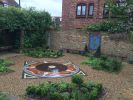 Epping Forest District Museum Tudor Rose Mosaic | Public Mosaics by Paul Siggins - The Mosaic Studio | Epping Forest District Museum in Waltham Abbey. Item composed of stone