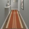 Handwoven Woolen Terracotta Runner Rug | Rugs by Evergreen Carpets. Item composed of wool compatible with boho and minimalism style