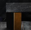 Scorcio - Nero Marquinia marble and gold leaf Dining table | Tables by DFdesignLab - Nicola Di Froscia. Item composed of metal and marble in contemporary style