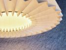 Industrial sconce with pleated empire lampshade | Sconces by Studio Pleat. Item made of metal with paper works with mid century modern & contemporary style