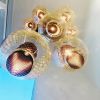 Galaxia | Pendants by Illuminata Art Glass Design by Julie Conway. Item composed of metal and glass
