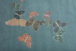 Spirit in the sky. Blue background rug with butterflies | Area Rug in Rugs by Sergio Mannino Studio. Item composed of fiber