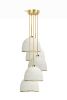 MushLume Stagger Chandelier - 5 Shades | Chandeliers by MushLume Lighting. Item composed of cement