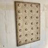 ‘Dapple’ w patina | Wall Sculpture in Wall Hangings by Greyya Jay. Item made of wood & cement