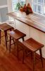 Mid-Century Modern Saddle Stool | Bar Stool in Chairs by The Strong Oaks Woodshop. Item composed of walnut in minimalism or mid century modern style