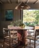 Red Travertine Round Pedestal Dining Table | Tables by Phidias Atelier. Item made of stone