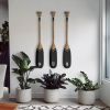 Black Wagülen Painted Paddle - Decor Object | Wall Sculpture in Wall Hangings by Hualle. Item composed of wood in eclectic & maximalism or art deco style