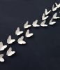 Lace Wings - Set of 21 | Wall Sculpture in Wall Hangings by Elizabeth Prince Ceramics. Item composed of stoneware in minimalism or contemporary style